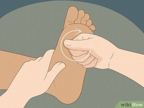 Step 8 Massage the sole of her foot with your fist.