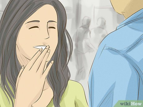 Step 5 Make her laugh to show off your funny side.